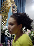 Lampedusa, sicilian girl visiting Mary  