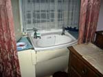 very basical hostel bathroom (with typical british moquette)