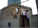 Slum and Agbar tower on background